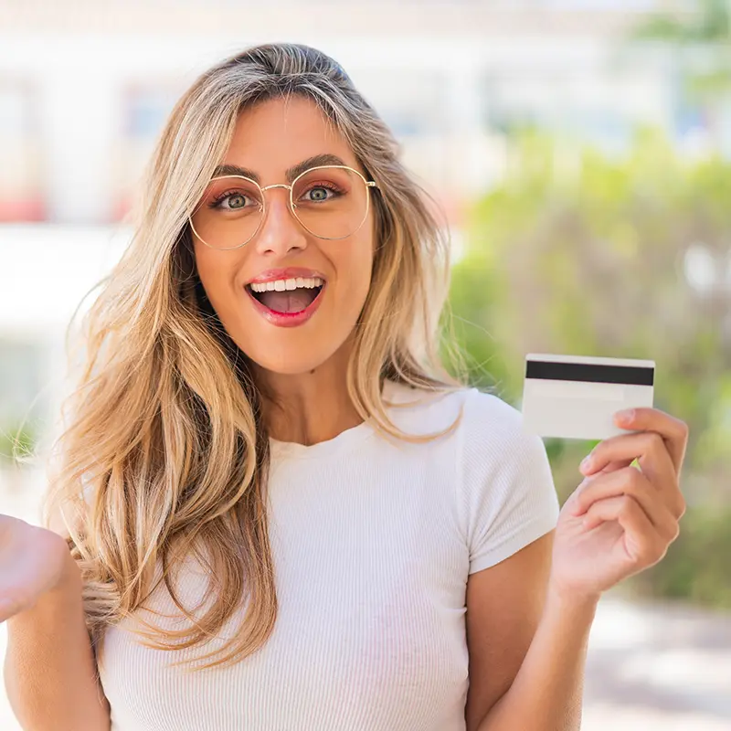 woman holding credit card