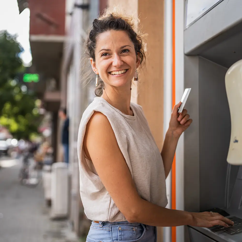 woman at atm machine