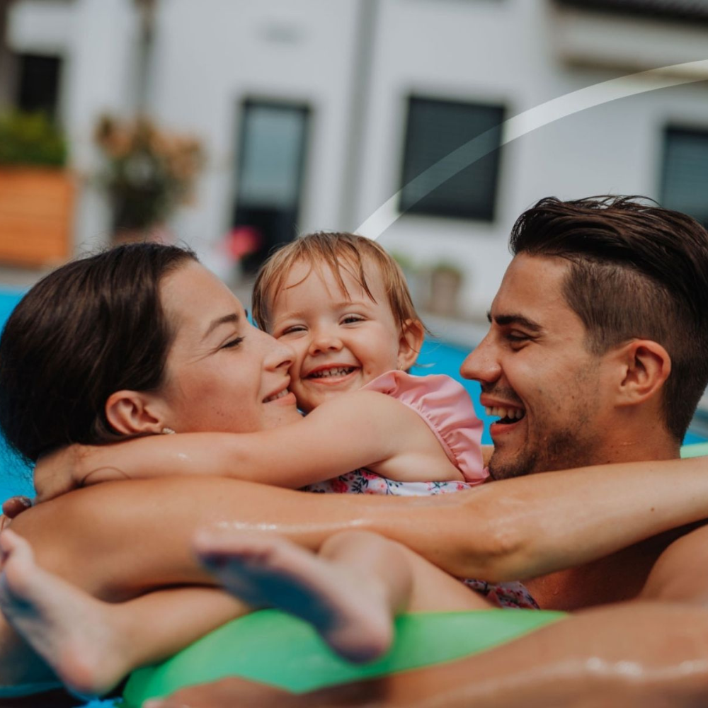 family in swimming pool