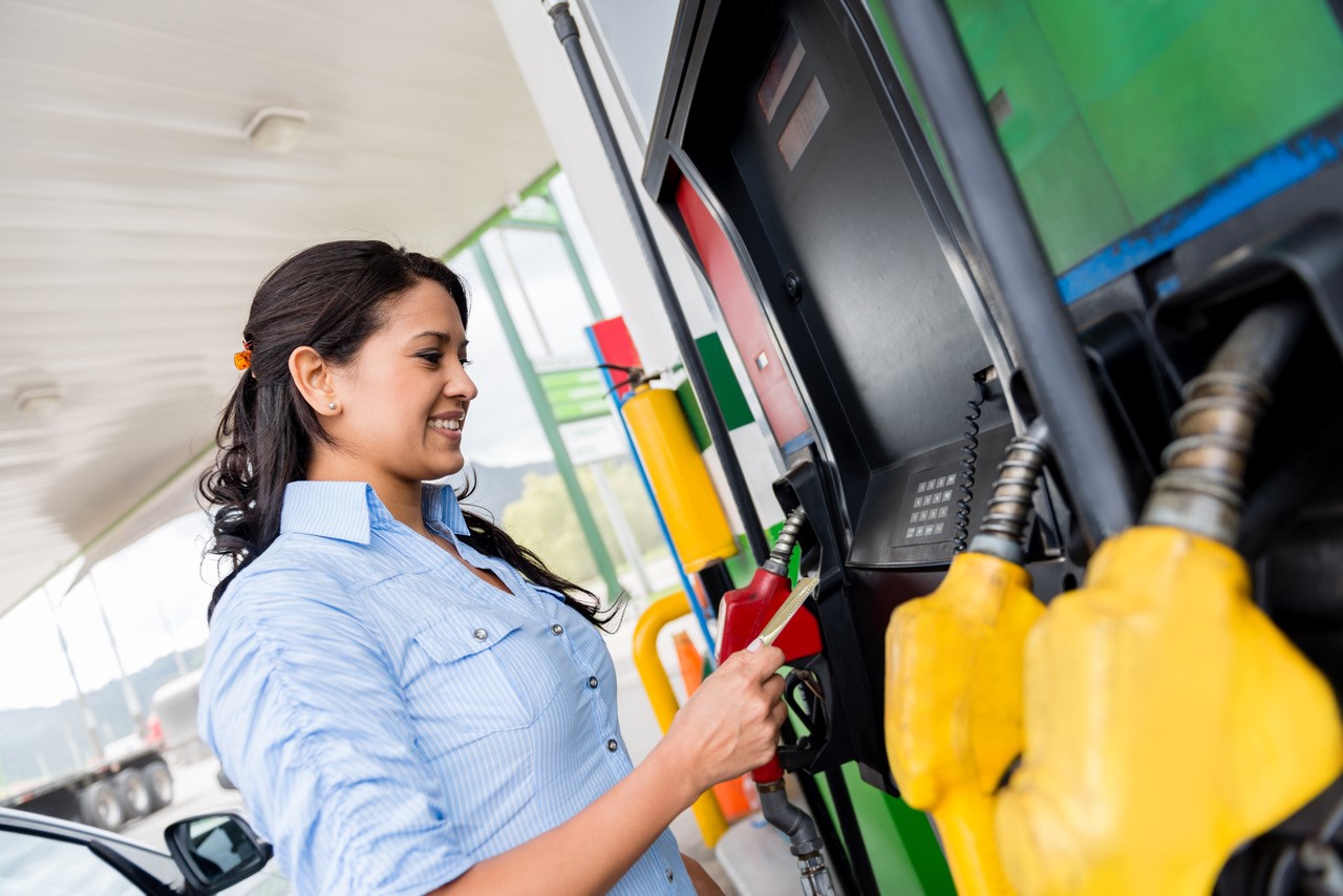 Image of Woman Pumping Gas Image of Woman Pumping Gas